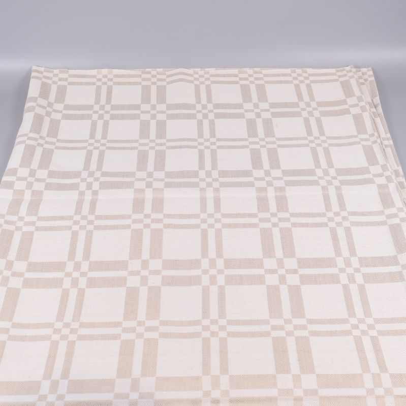 Uppvikt duk som visar hela rutmönstret