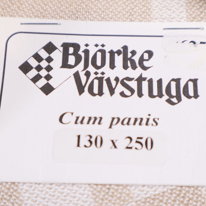 Etikett med text Björke Vävstuga Cum panis 130x250