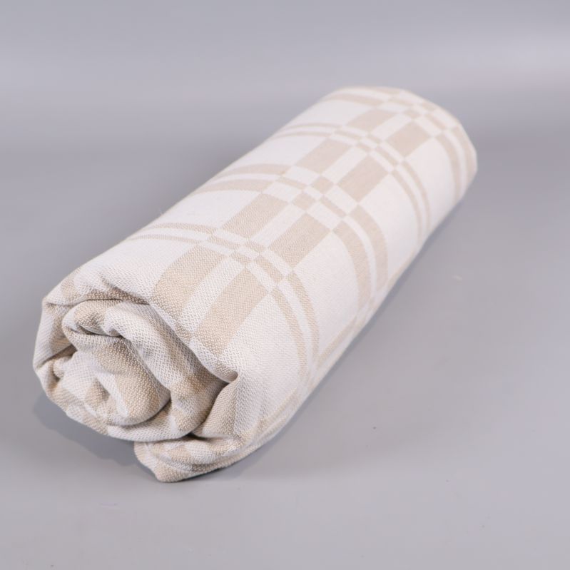 Duk hoprullad på ljus bakgrund