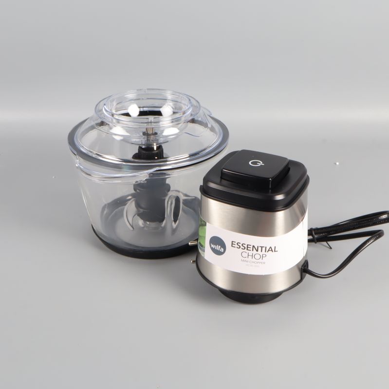 Motordelen och glasbehållare ligger sida vid sida