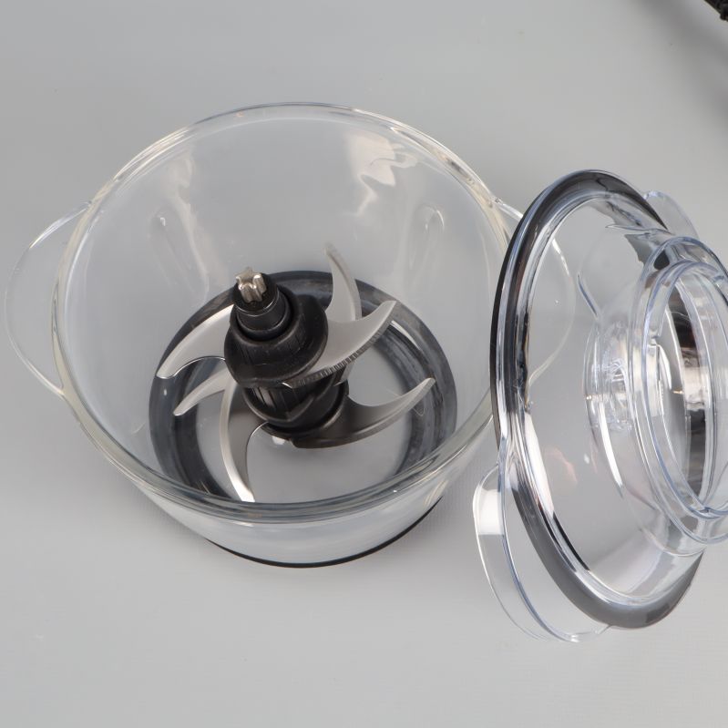 Tre blad i rostfritt stål i glasbehållaren