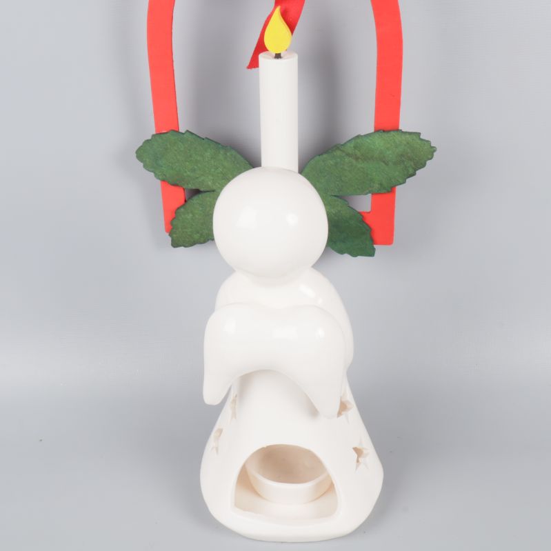 Baksida av ängellykta, öppning för värmeljus synlig