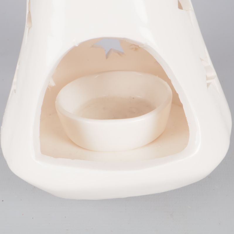 Närbild på insidan av ljuslyktan med telyshållare