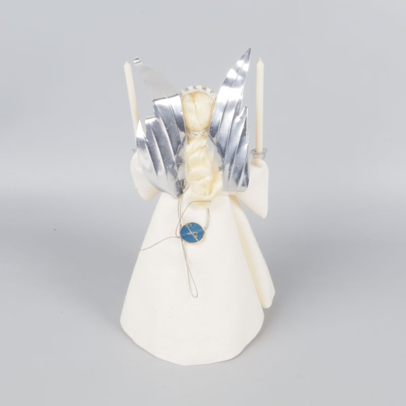 Baksidan på ängelspeldosa