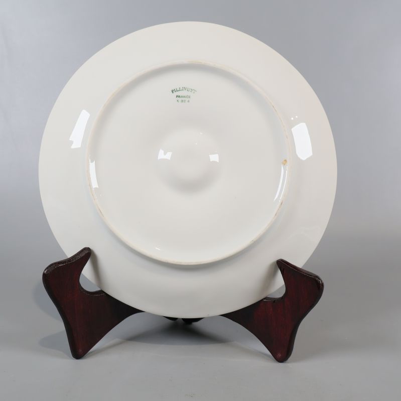 Närbild på baksidan av ostronfat med tydlig stämpel