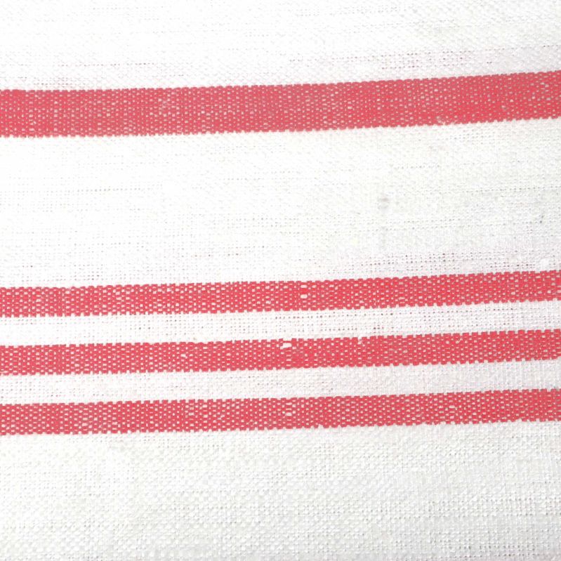 Närbild av tygstruktur och ränder i rött på vitt