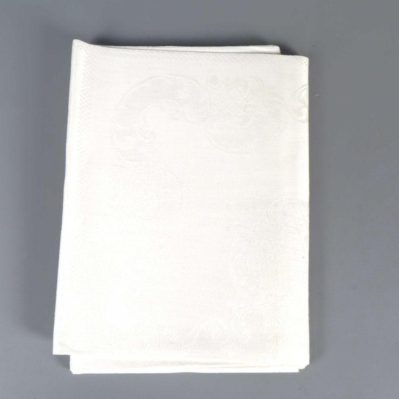 Hopvikt vit servett med subtilt vävt mönster