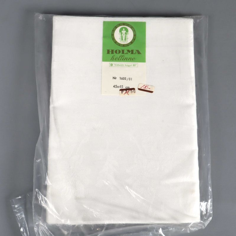 Framsidan av servetter i linne