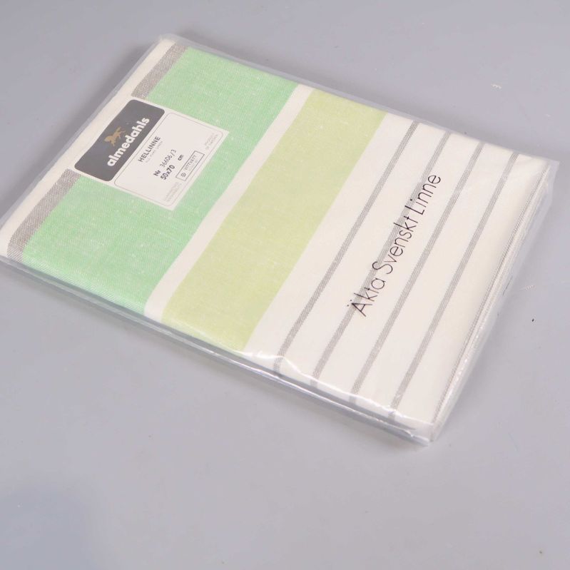 Sidovy av hellinneförpackning