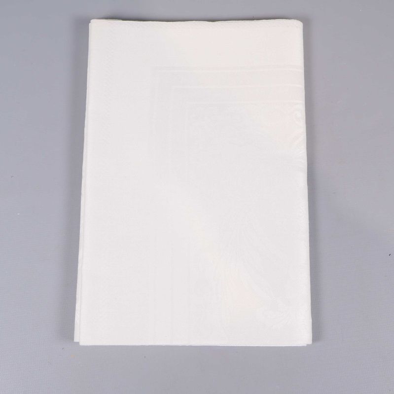 Vikt vit linneservett utan synlig etikett