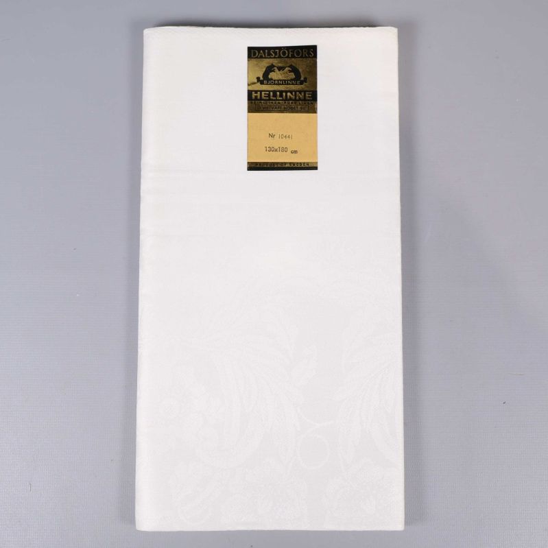 Vit duk i vikt skick med etikett från Dalsjöfors Hellinne