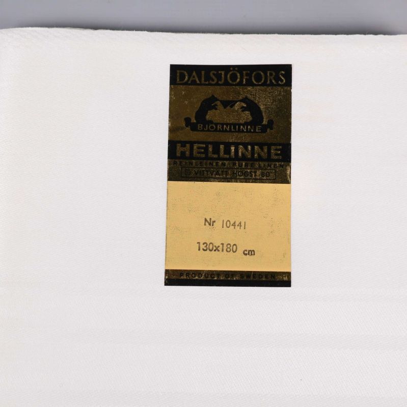 Närbild på Dalsjöfors Hellinne etikett 130x180 cm
