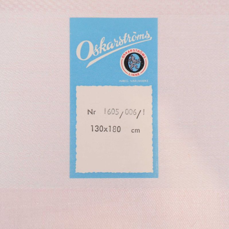 Närbild av Oskarströms etikett med måttangivelse