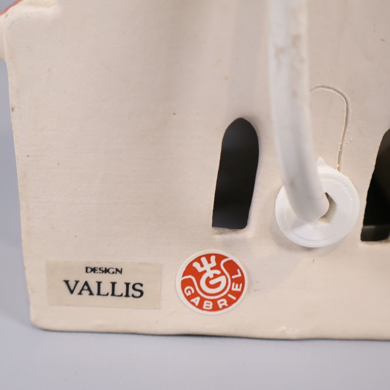 Etikett med texten design Vallis och Gabriel-märke