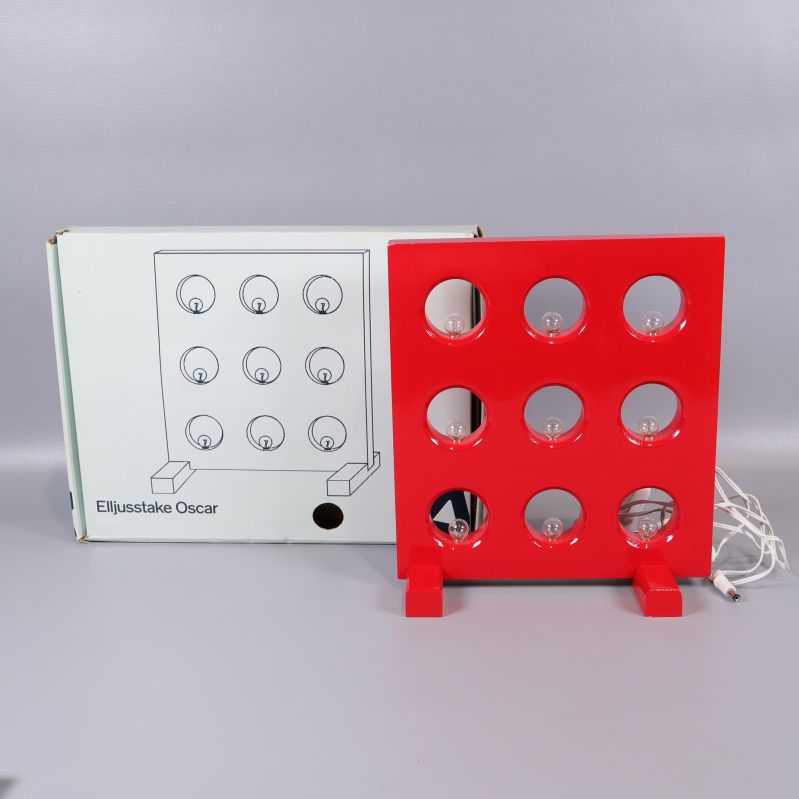 Röd elljusstake med nio lampor och originalkartong