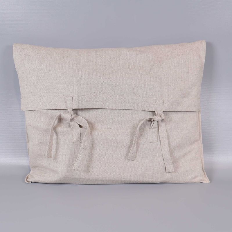 Beigefärgad tygpåse med knytband till duksetet