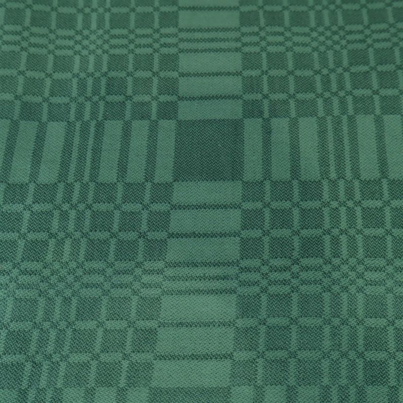 Närbild av grönt rutmönstrat tyg