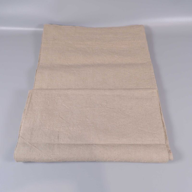 Beige linnelöpare helt utrullad