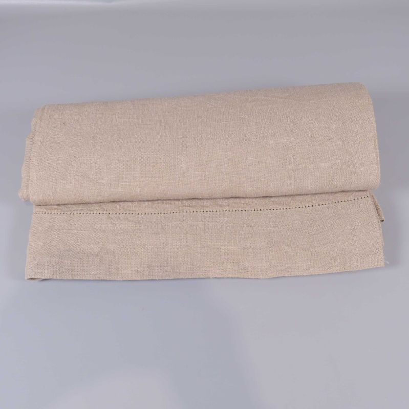 Linnelöpare hoprullad med synlig sidsöm