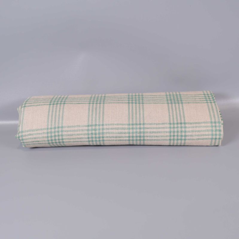 Rullad rutig duk i beige och grönt
