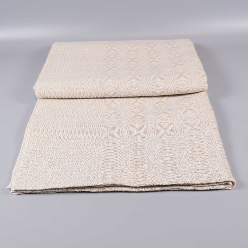 Hopvikt mönstrad duk i beige 