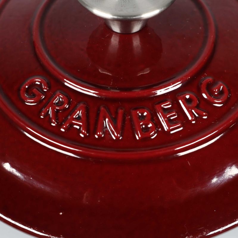 Lock med Granberg-logo i närbild upptill