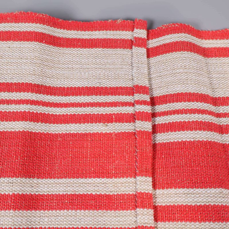 Närbild på Löpare  vävda struktur och söm