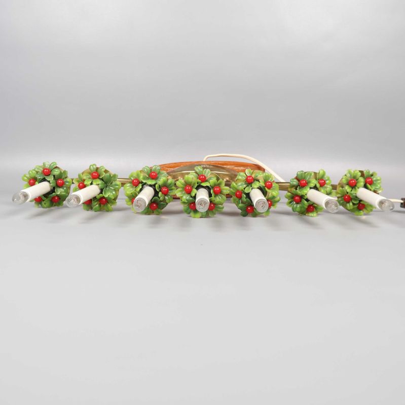 Ljusstake ovanifrån som visar kransarna runt varje ljus