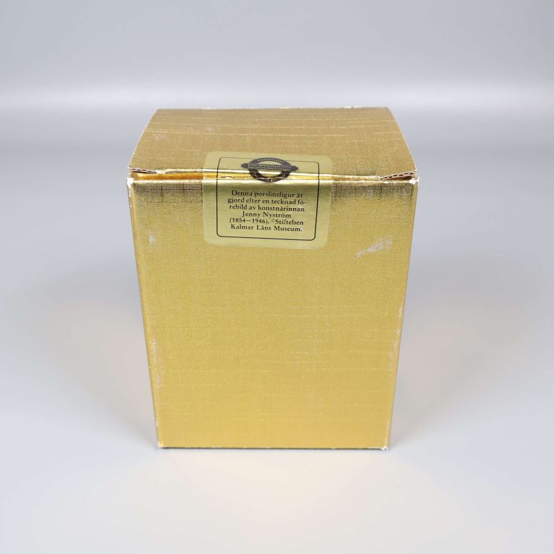 Guldfärgad originalkartong till tomtefigur