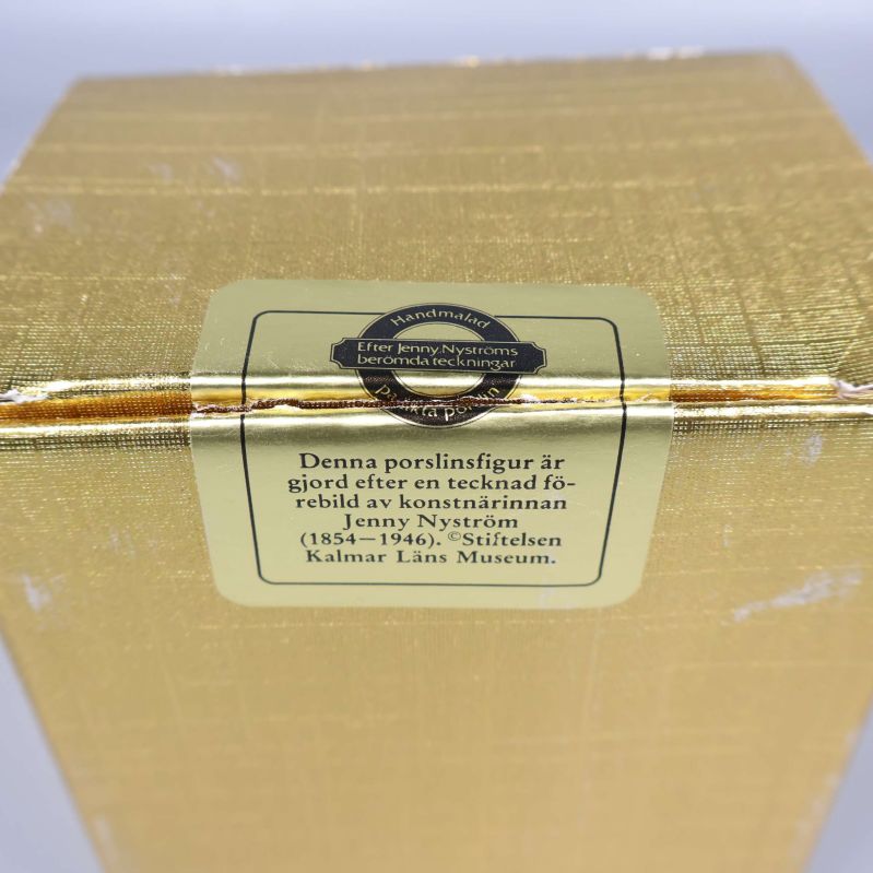 Närbild av bruten försegling med text