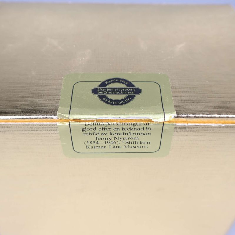 Närbild av bruten försegling med text