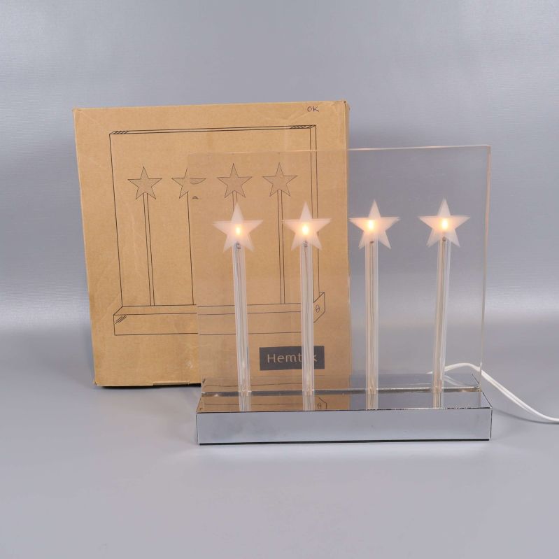Adventsljusstake med fyra stjärnor och originalkartong