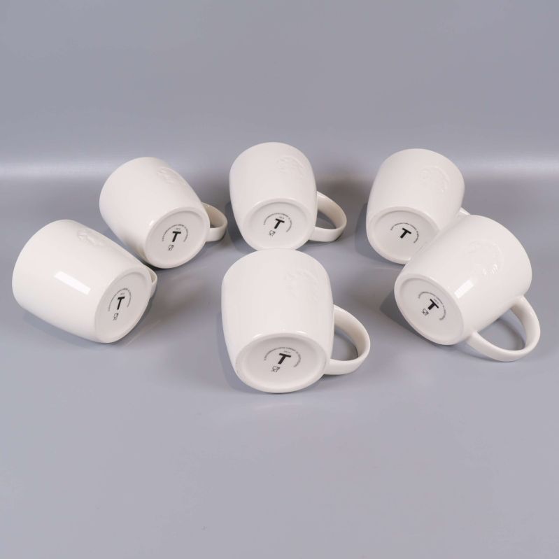 Sex vita Starbucks-muggar vända upp och ner