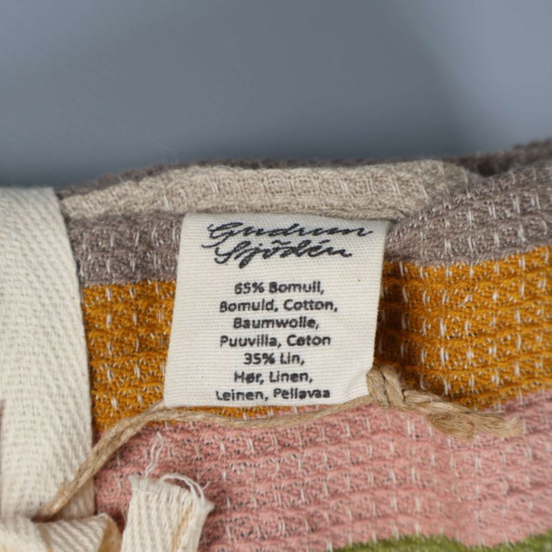 Materialetikett med bomull och lin-text