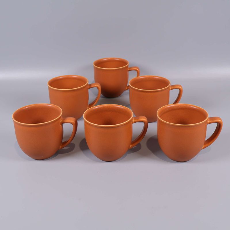 Sex kaffekoppar med rund form synliga framifrån