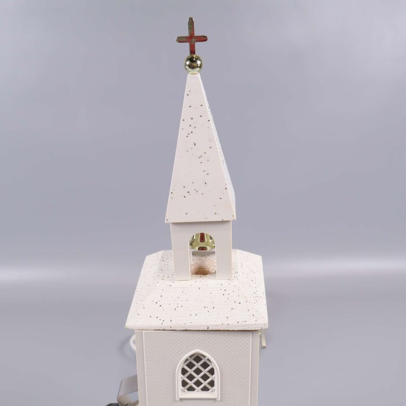 Kyrktornets detalj med guldspira och kors