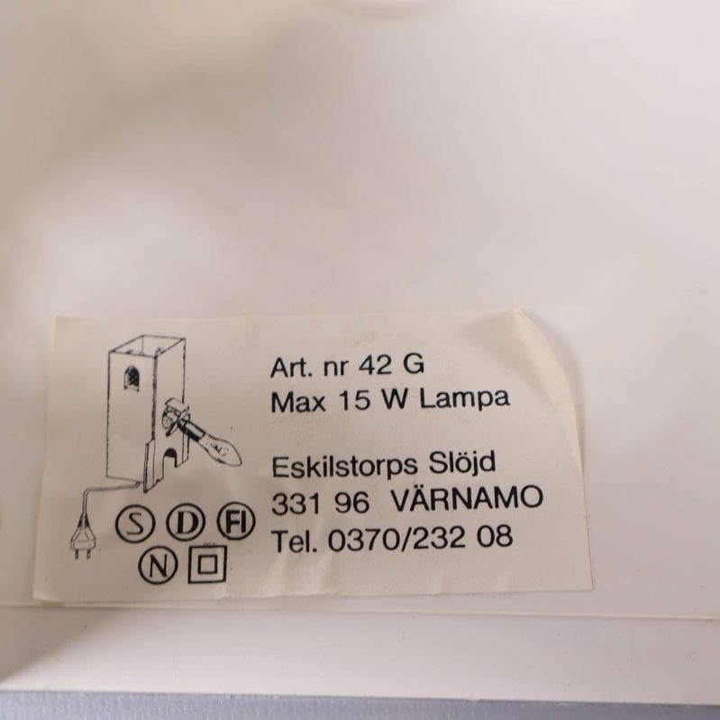 Produktetikett från Eskilstorps Slöjd med kontaktuppgifter