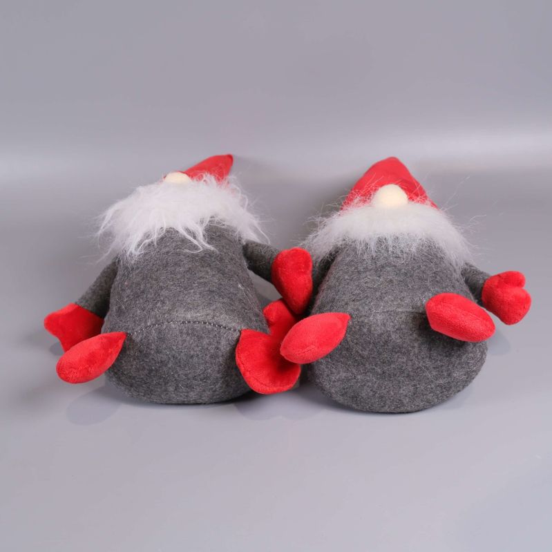 Tomtedockor ligger ner med benen synliga, sett underifrån