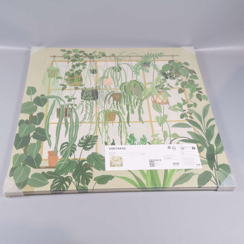 Tavla med växtmotiv fotograferad liggande