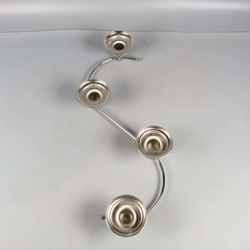 S-formad ljushållare fotad ovanifrån