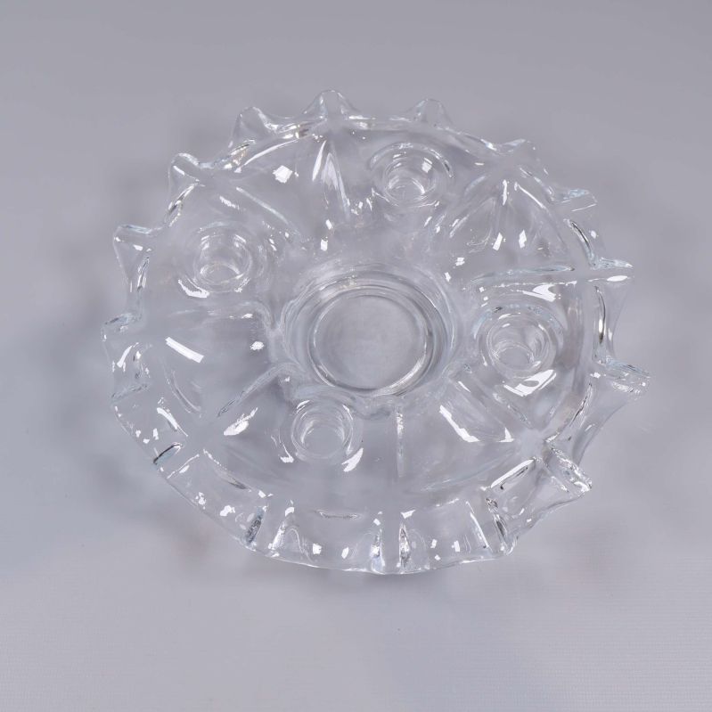 Ovanifrånvy av rund ljusstake i klart glas