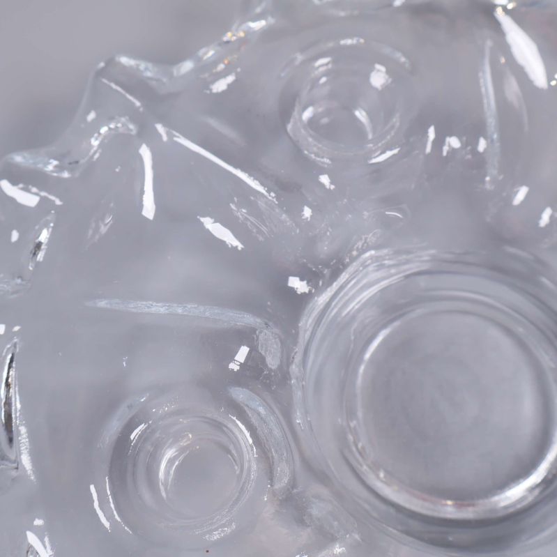 Närbild på mönster i klarglas ljusstake