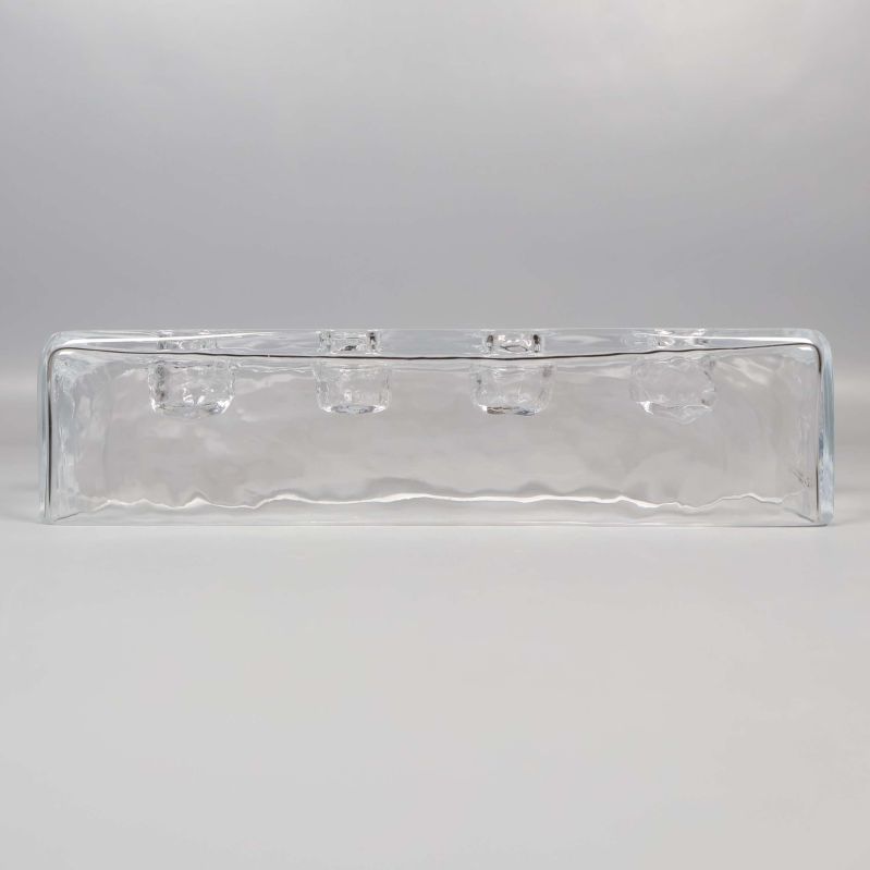 Ljusstake i klart glas sedd från sidan