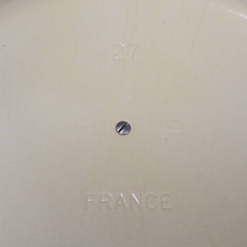 Insida av lock med texten 27 France