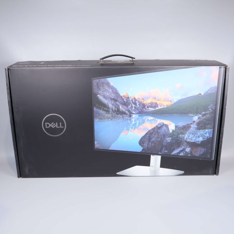 Förpackning till datorskärm med bild på skärmen framifrån