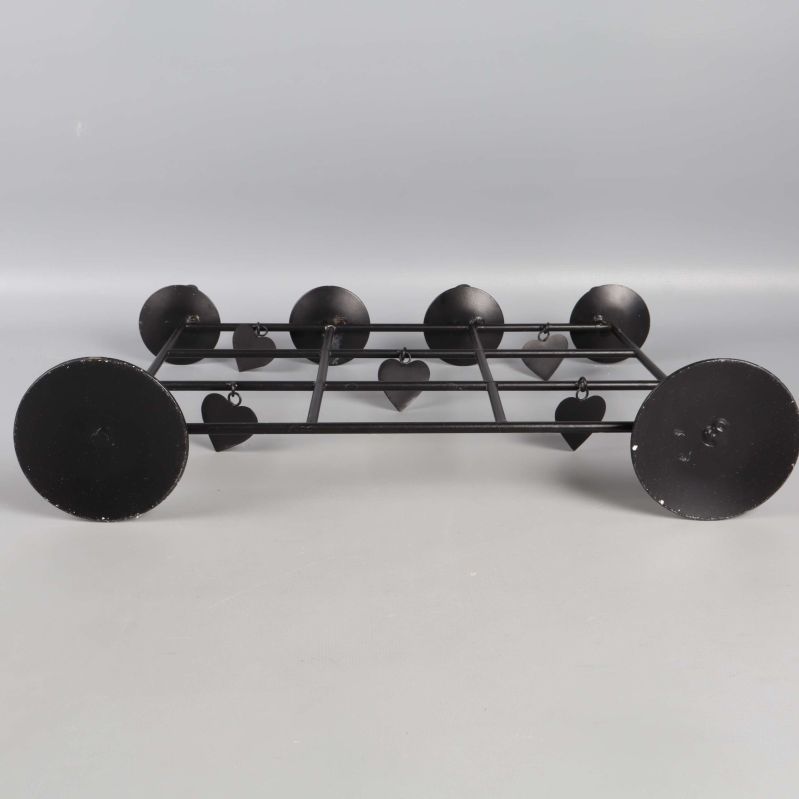 Ljusstake fotograferad liggande med fokus på underdel