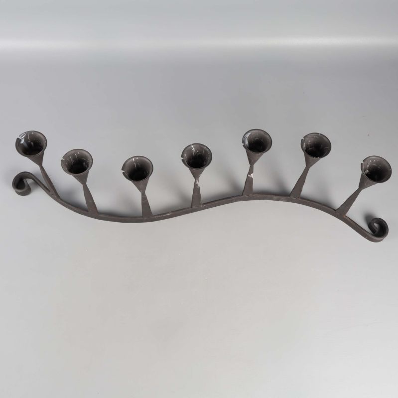 Ljusstake med sju hållare sedd uppifrån