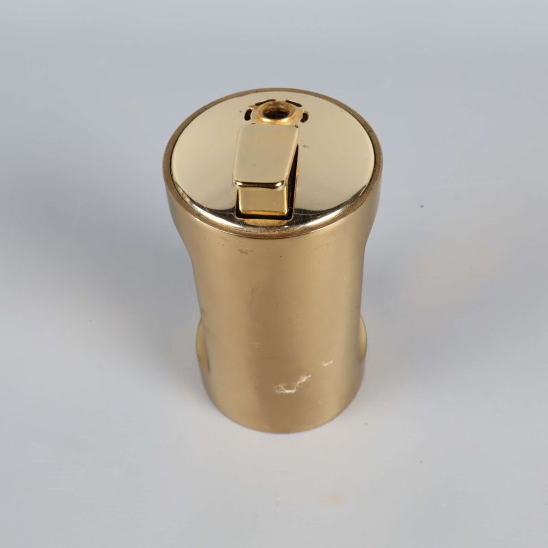 Tändare sedd uppifrån med spak och öppning