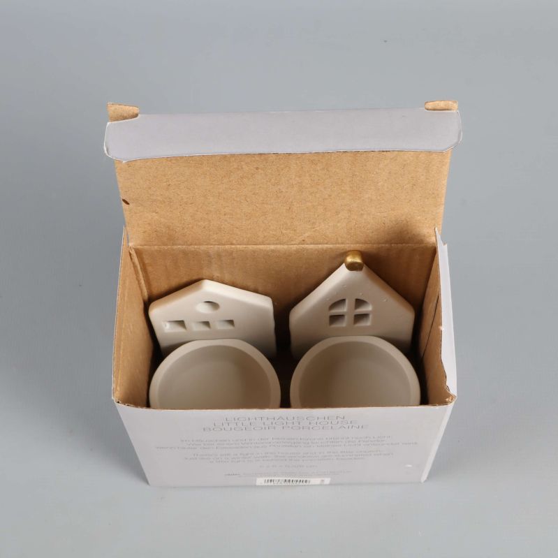 Ljushållare i form av hus i originalförpackning sett ovanifrån