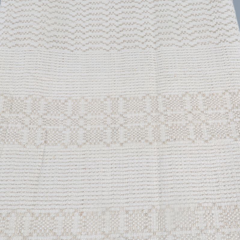 Närbild av löparens ljusa, vävda mönster